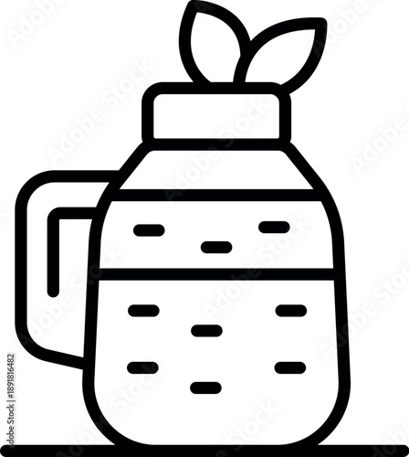 Glass jug filled with detox water and mint leaves, embodying a healthy lifestyle