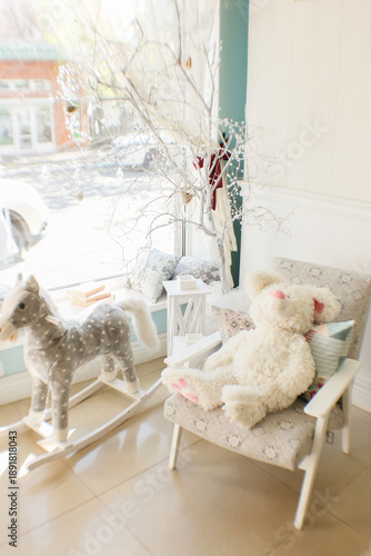 Vintage shop interior with decorative toys, boxes and flowers