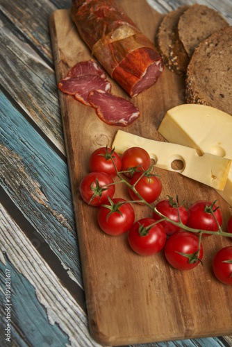 Wallpaper Mural Sliced food on a wooden board Torontodigital.ca