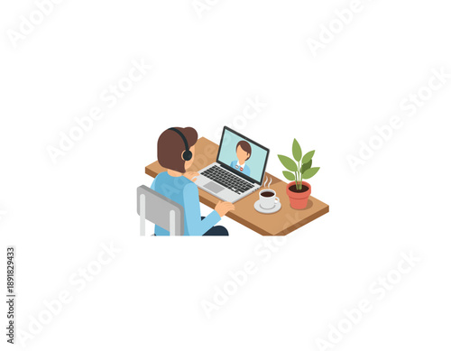 Remote worker on video call with colleague at modern home office desk