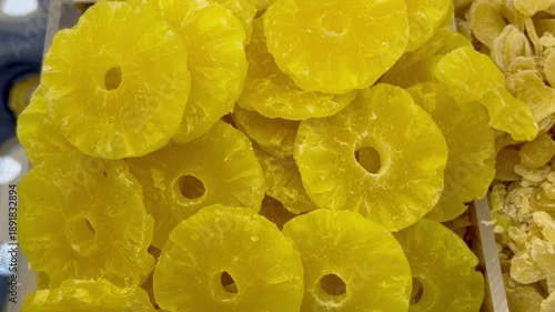 A colorful dry‑food display in Dubai’s Deira Old Souk, showcasing spices, nuts, and grains in vibrant arrangements.
