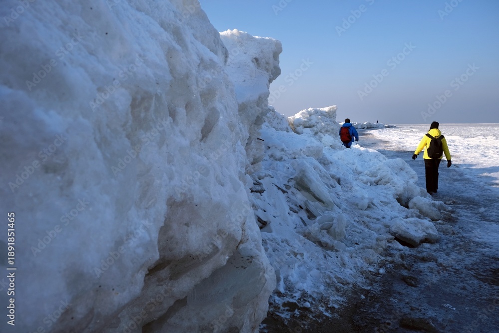 custom made wallpaper toronto digitalIce toros (mountains of piled-up ice) on the beach in Mikoszewo, Baltic Sea, Pomerania, Poland. This is a very interesting and rare phenomenon. Silhouettes of people walking and taking photos.
