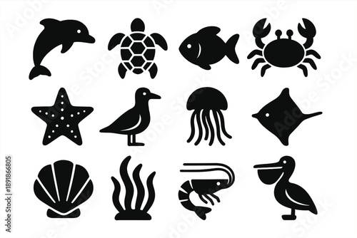 Marine Life Icons. Solid style icons of Marine life: dolphin, turtle, fish, crab, starfish, seagull, jellyfish, manta ray, seashell, seaweed, shrimp