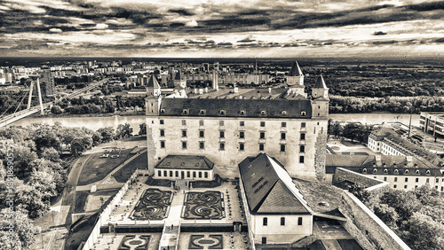 Photography Aerial view of Bratislava Castle and city skyline on a summer afternoon