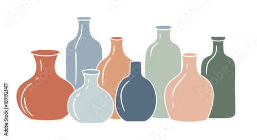 Collection of Assorted Ceramic and Glass Bottles in Various Shapes and Colors.