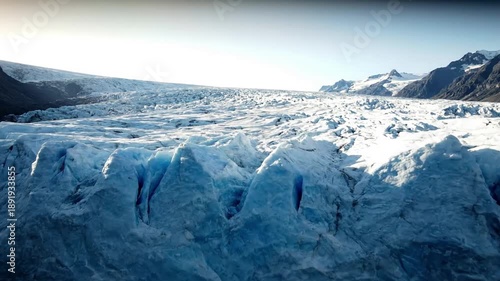 Time-lapse of Arctic Glacier Flow Focus on the imperceptible, monumental movement of the ice mass over time.