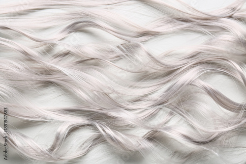 Εκτύπωση καμβά Curly grey hair strands on white background