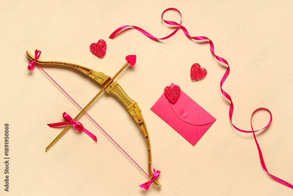 Obraz premium Composition with cupid's bow, envelope and hearts on color background. Valentine's Day celebration