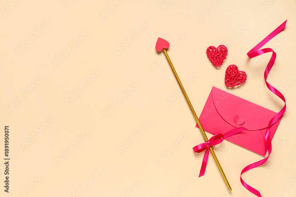 Fototapeta premium Composition with cupid's arrow, envelope, hearts and ribbon on color background. Valentine's Day celebration
