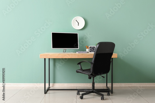 Stylish workspace with alar...