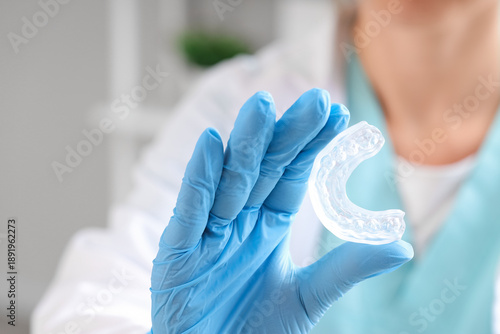 Female dentist with occlusa...
