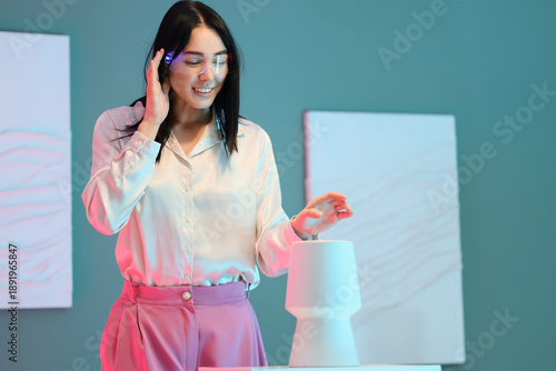 Young woman with VR glasses...