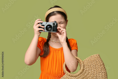 Cute girl with wicker bag t...