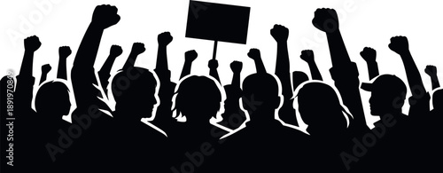 Silhouetted crowd with raised fists and sign at a protest
