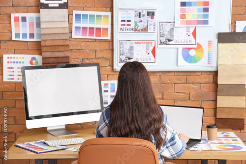 Female designer working wit...