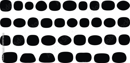 A collection of rounded black shapes arranged in a grid pattern on a white background viewed from directly above