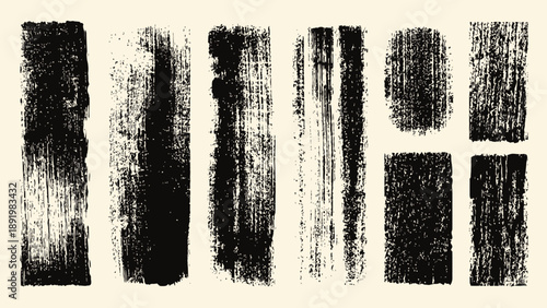 Abstract black brush strokes on textured beige background  