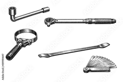 Vintage mechanical tools: collection of wrenches, handles, and gauges for precision work