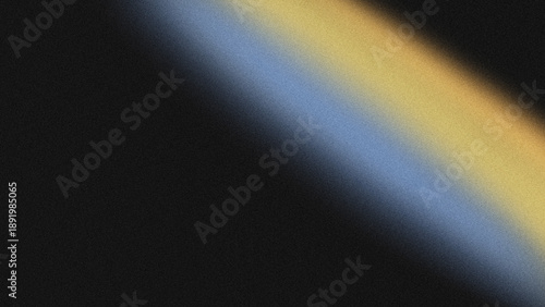 Vászonkép Diagonal gradient band of yellow and bluish-grey light on a dark background with a grainy texture