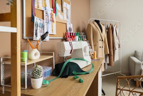 Modern tailor's workplace w...