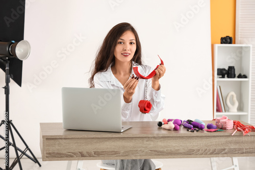 Female Asian blogger with h...