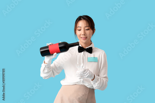 Young Asian smiling waitres...
