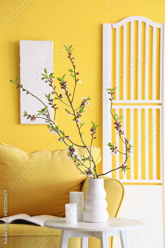 Coffee table, yellow sofa a...