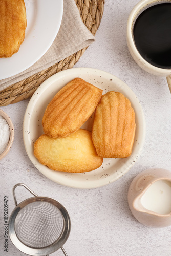 Saucer with madeleines on l...