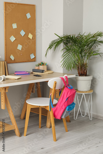 Modern school desk with sta...