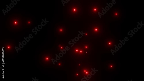 黒背景にゆっくり浮かび上がる赤色の粒子