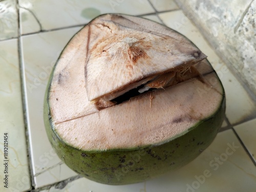 closeup of a refreshing young coconut.