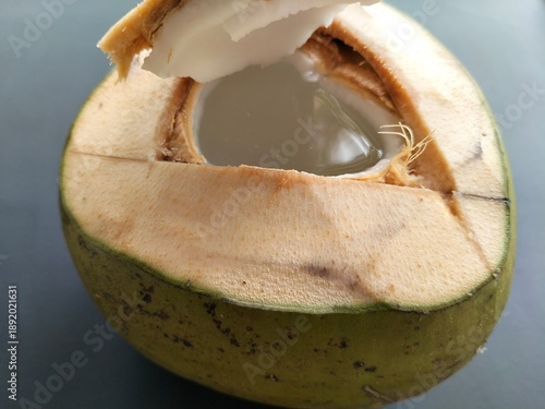 closeup of a refreshing young coconut.