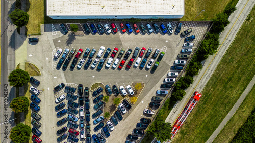 An aerial view of a car dealership parking lot in the Midwest