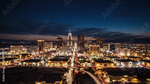 Wallpaper Mural Aerial view of a sprawling city skyline at dusk, illuminated with lights and traffic trails Torontodigital.ca