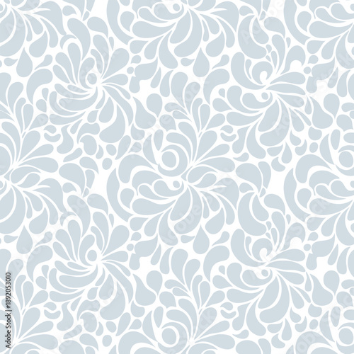 Elegant seamless pattern with swirling floral and leaf motifs