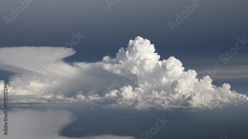 Wallpaper Mural Majestic cloud formations against a deep blue sky, viewed from above Torontodigital.ca