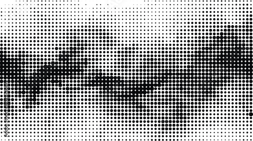 Halftone pattern with dark and light dots creating gradient