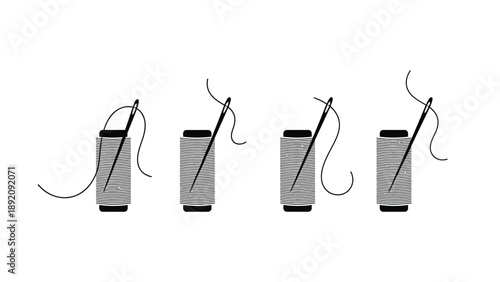 An illustration of four spools of thread with needles threaded through them