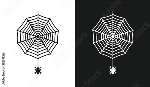 Black and white spider web umbrella with spider hanging down and