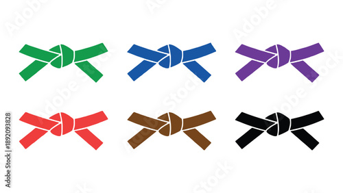 A collection of colorful martial arts belts in various stages of progression