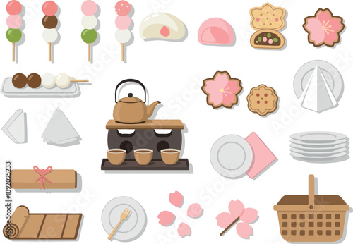 Japanese sweets and tea ceremony set with sakura blossom elements and picnic basket