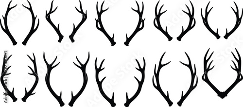 A collection of black deer antlers in various shapes and sizes presented as a graphic element on transparent background silhouette