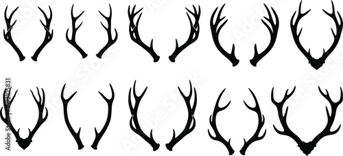 A collection of eight black deer antlers in varying shapes and sizes presented as a silhouette on transparent background high quality