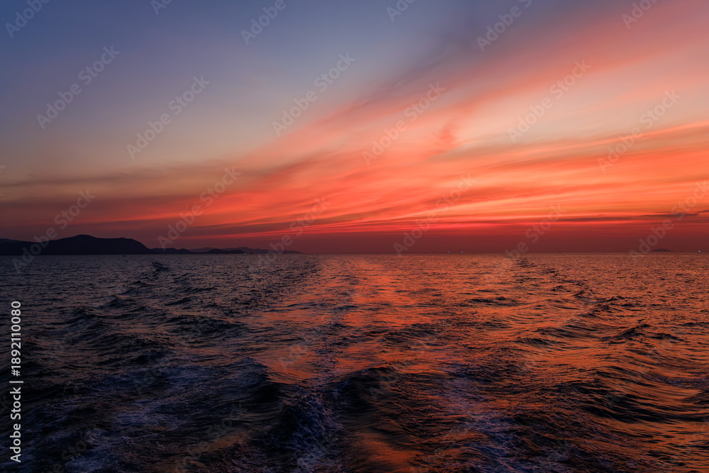 Fototapeta premium morning sunshine with the cloudy sky over the sea