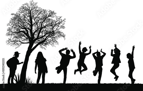 Joyful silhouette of diverse people jumping and celebrating under a large, bare tree on a grassy field, conveying freedom and happiness