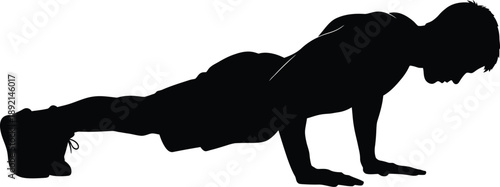 Silhouette of a fit young man performing a perfect push up exercise maintaining a strong plank position demonstrating muscular strength and dedication to physical fitness training routines.