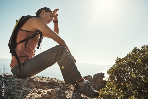 Bilde på lerret Tired, relax and hiking with woman outdoor for adventure, rest stop and fatigue