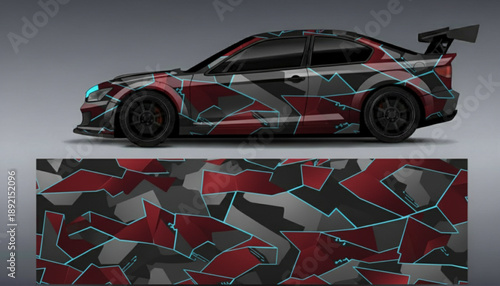 A sporty car with a modern geometric camouflage wrap design.