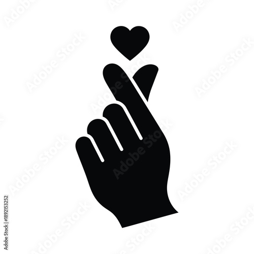 Silhouette of a hand with a heart above the index finger