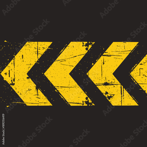 Bild auf Leinwand Yellow Chevron Arrow Warning Sign on Black Background – Road Safety Direction Sy
